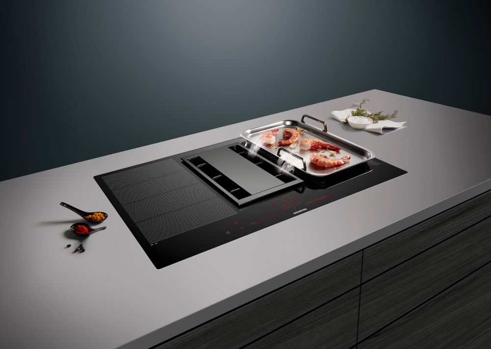 Lorsqu'une sonde sur la casserole indique qu'une température sélectionnée a été atteinte, cette plaque de cuisson Siemens la maintient à niveau