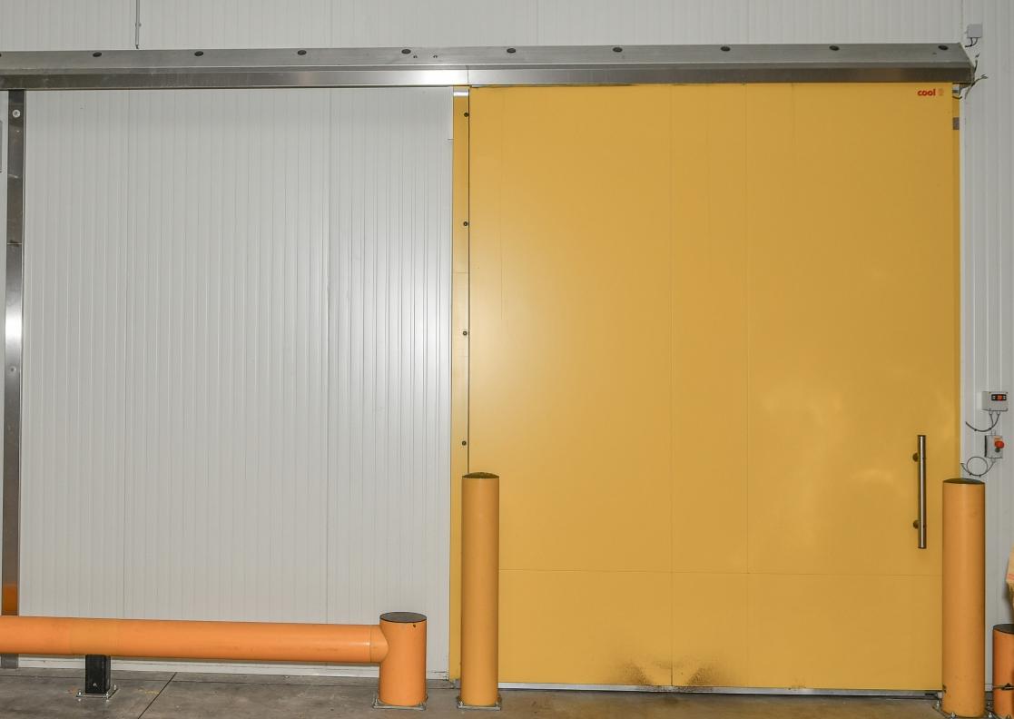 Une porte coulissante pour un espace réfrigéré où il n’y a pas trop de trafic