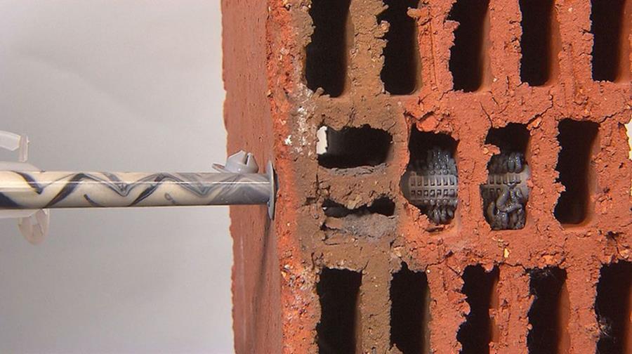De spuitmond vermengt de twee componenten van he