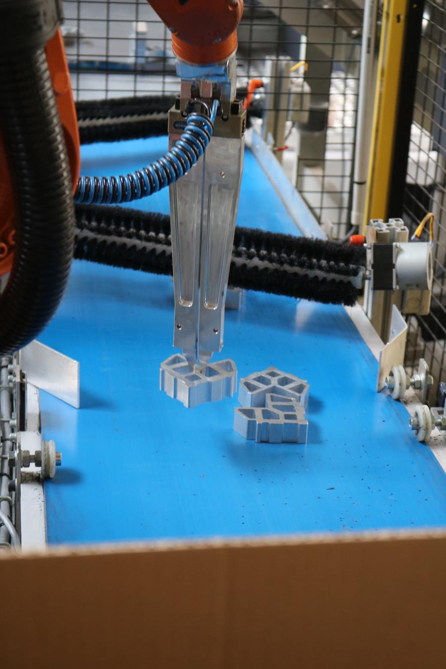 Automatisch opnemen en positioneren in doos